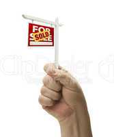 Sold For Sale Real Estate Sign In Fist On White