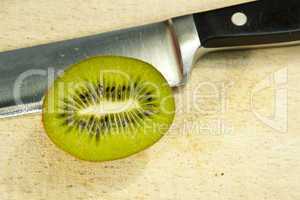 Kiwi fruit and knife
