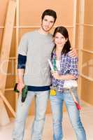 Home improvement young couple with repair tools
