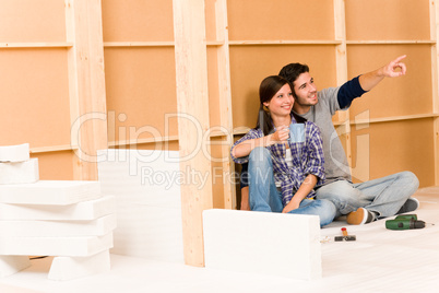Home improvement young couple relax building wall