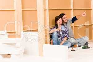 Home improvement young couple relax building wall
