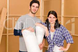 Home improvement young couple work on renovations