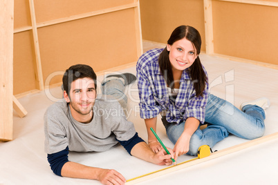 Home improvement young couple work on renovations