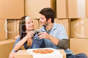 Moving new home young couple have lunch