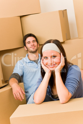 Moving new home young couple sitting floor