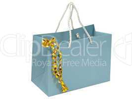 Blue gift bag with golden decorative tape.