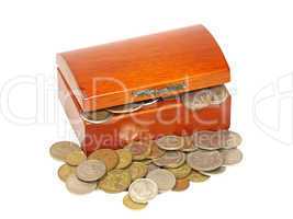 Wooden chest with different metal coins.
