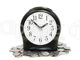 Black clock and coins.