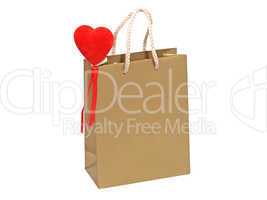 Golden gift bag with red heart.