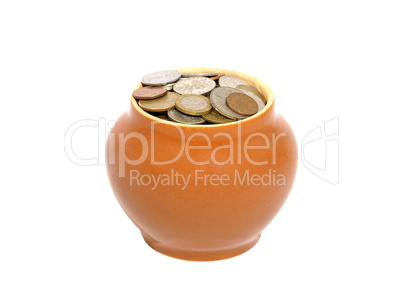 Ceramic pot with metal money.