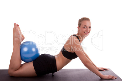 Junge Frau mit Gymnastikball