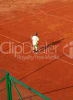 Boy On Tennis Court
