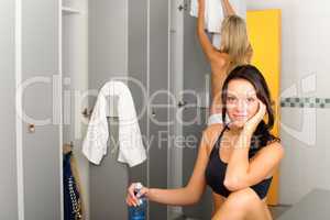 Locker room young sportive woman outfit sitting