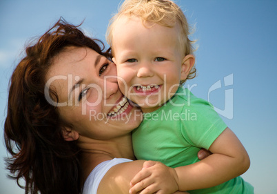 Child with mother play outdoors