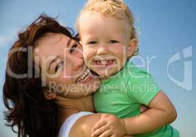 Child with mother play outdoors