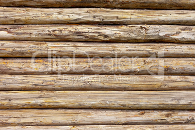 Wooden logs wall of rural house background