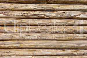 Wooden logs wall of rural house background