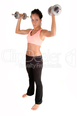 Girl lifting dumbbells.