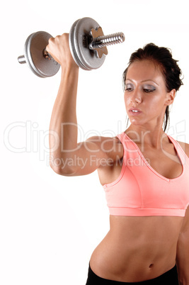 Girl lifting dumbbells.