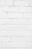 white painted brick wall