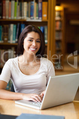 Portrait of a student with a laptop