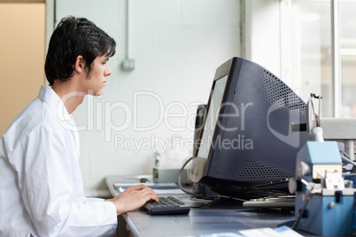 Student working with a monitor