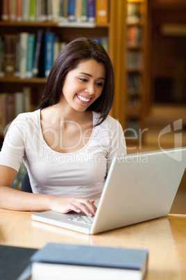 Portrait of a student working with a laptop