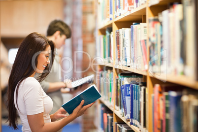 Students reading while standing up