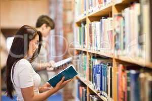 Students reading while standing up