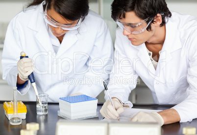 Scientists making an experiment
