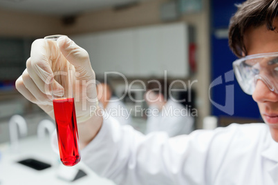 Scientist holding a test tube