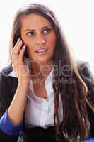 Portrait of a surprised woman on the phone