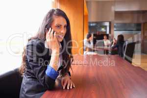 Young woman making a phone call