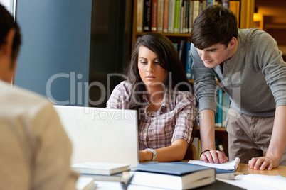 Students working together with a laptop