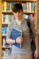 Young student holding a book