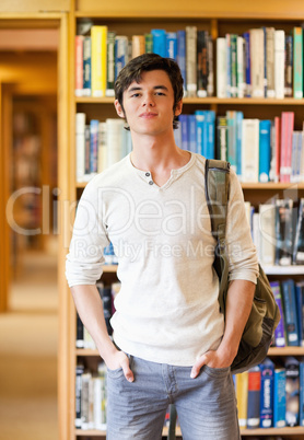 Portrait of a smiling student standing up