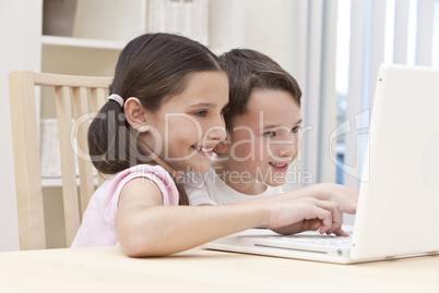 Boy & Girl Children Using Laptop Computer at Home