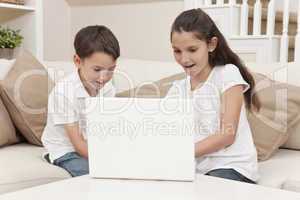 Boy & Girl Children Using Laptop Computer at Home