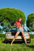 Attractive woman ready for washing a car