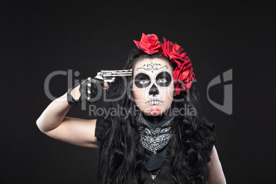 Serious woman in skull mask shot in head