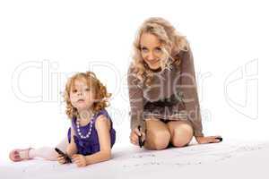 Happy mother look at daughter draw and smile