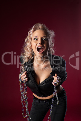 Woman in sexy leather jacket cry with chain