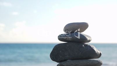 Sea - Beach - Stones Stacked with Ocean in Background