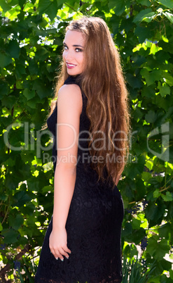 Portrait beautiful girl in a dress black