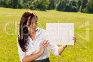 Businesswoman sunny meadow look at empty banner