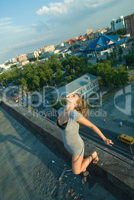 Young woman on roof