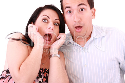 young adult couple in cinema movie theater scared while watching