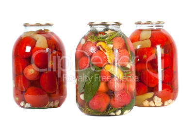 red tomatoes in a glass jar