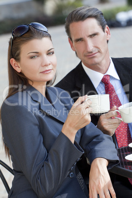 Beautiful Couple Man and Woman Having Drink At Cafe