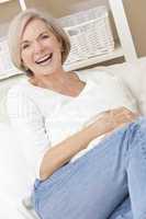 Attractive Happy Senior Woman Laughing at Home